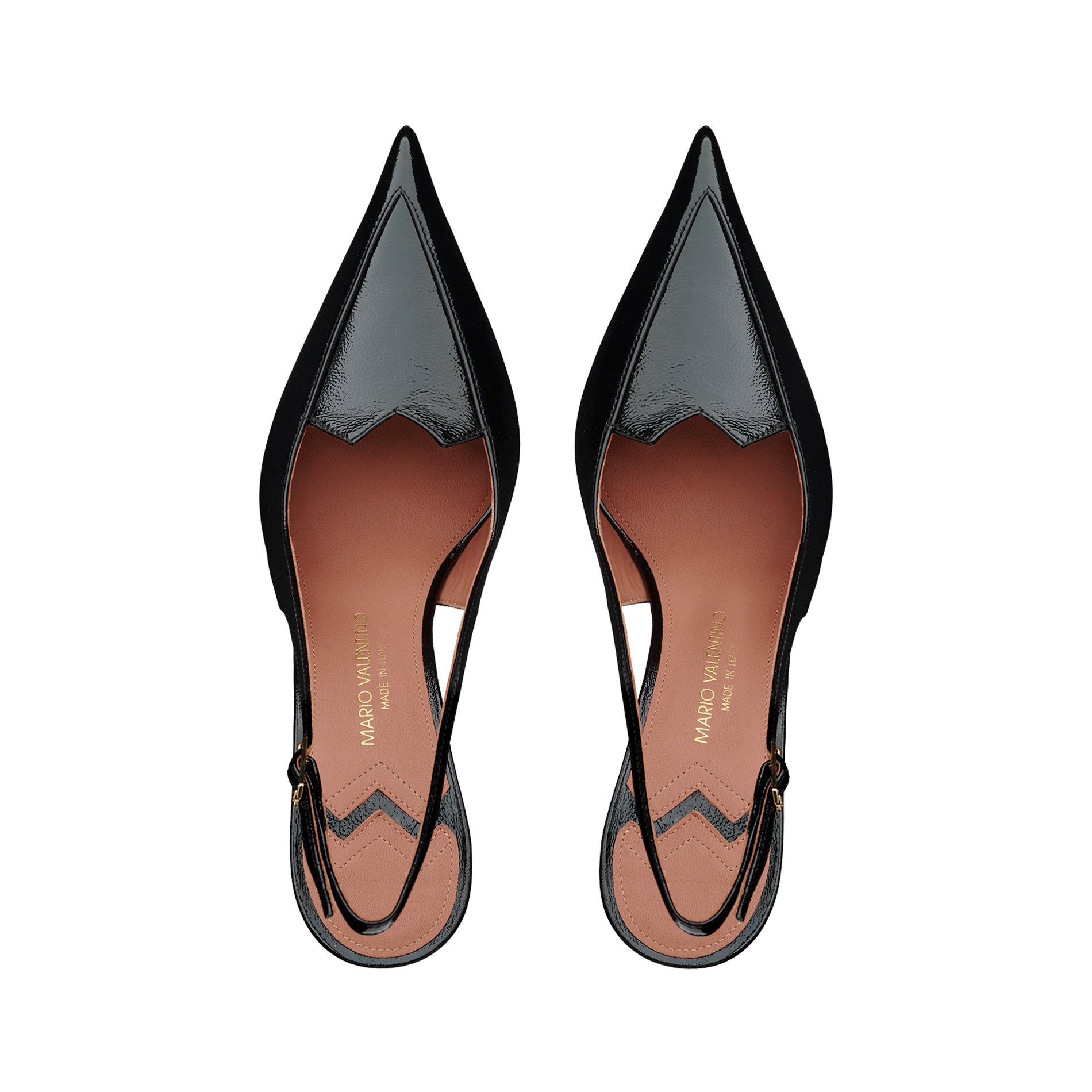 Mario Valentino black patent leather slingback pumps with pointed toe silhouette, refined kitten heel and adjustable strap. Iconic MV logo detail. Made in Italy.