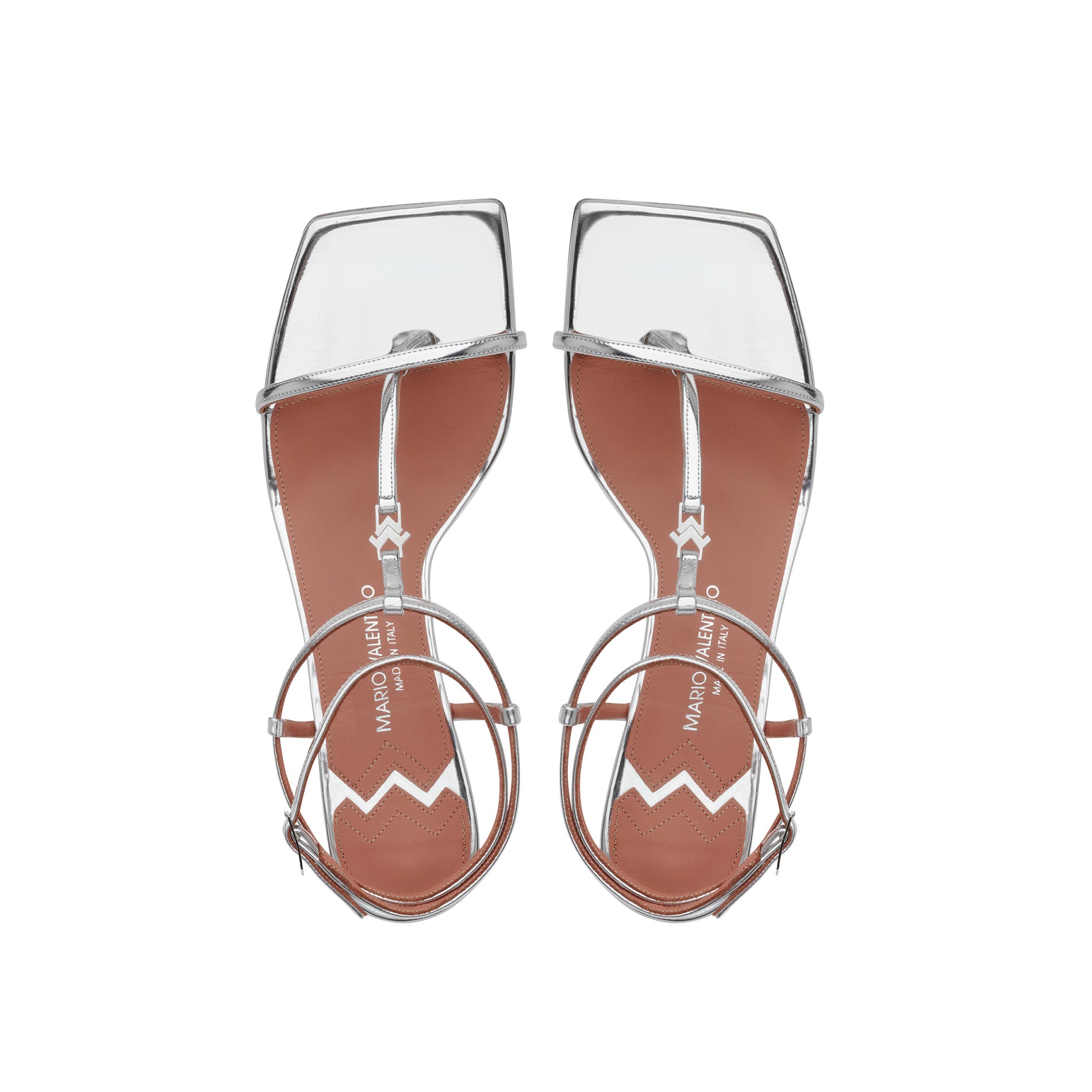 Silver-tone leather T-bar sandal with adjustable ankle strap and midi heel.