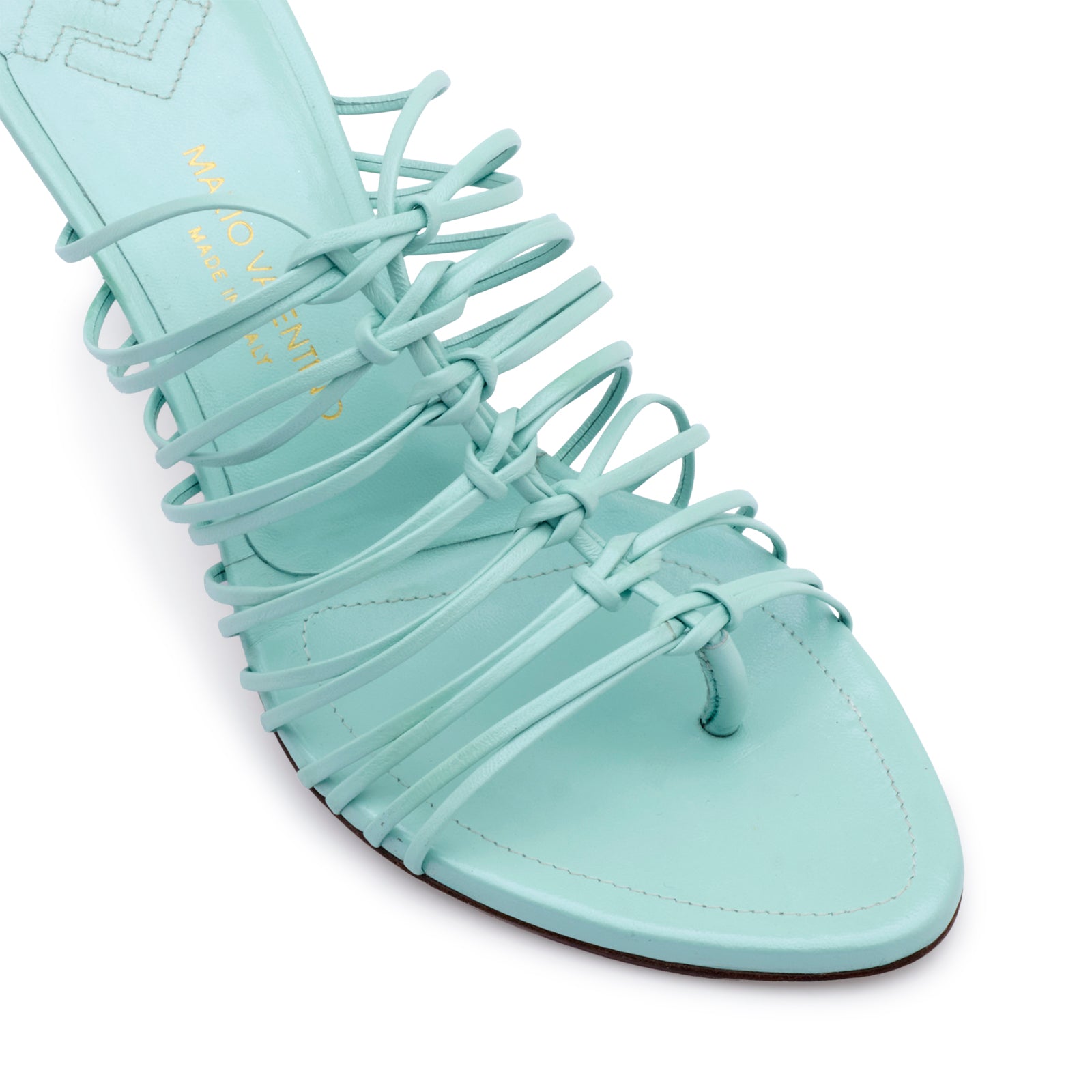Elegant kidskin green mint leather thong sandals featuring stiletto heel, leather sole, and iconic logo detail