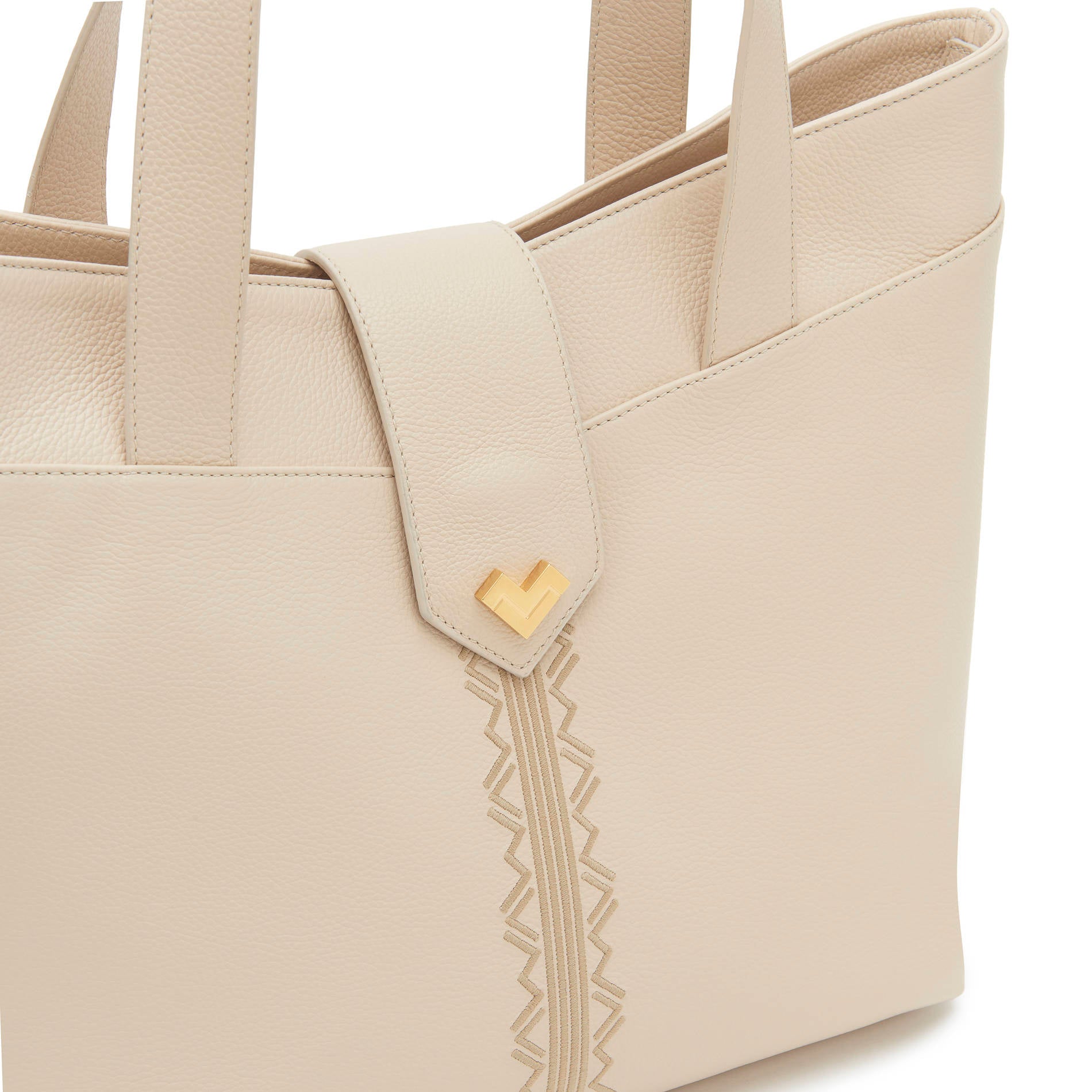 Powder leather tote bag detail with gold logo and tonal embroidery, luxury designer handbag Made in Italy