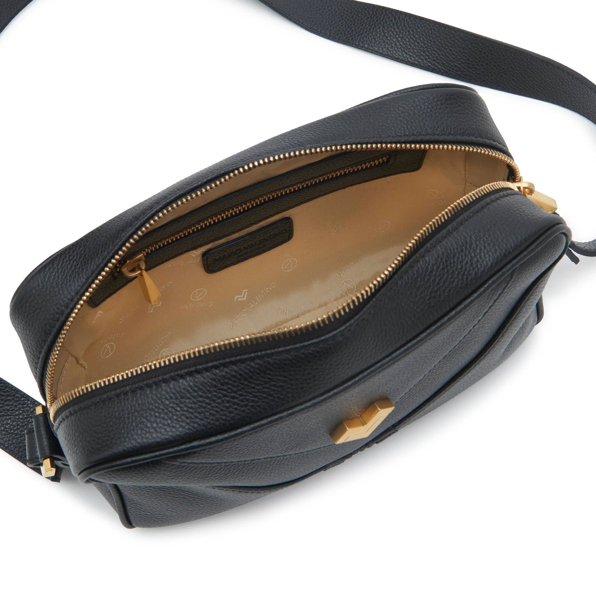 Inside black leather crossbody bag with logo lining and inner pocket, compact luxury handbag.