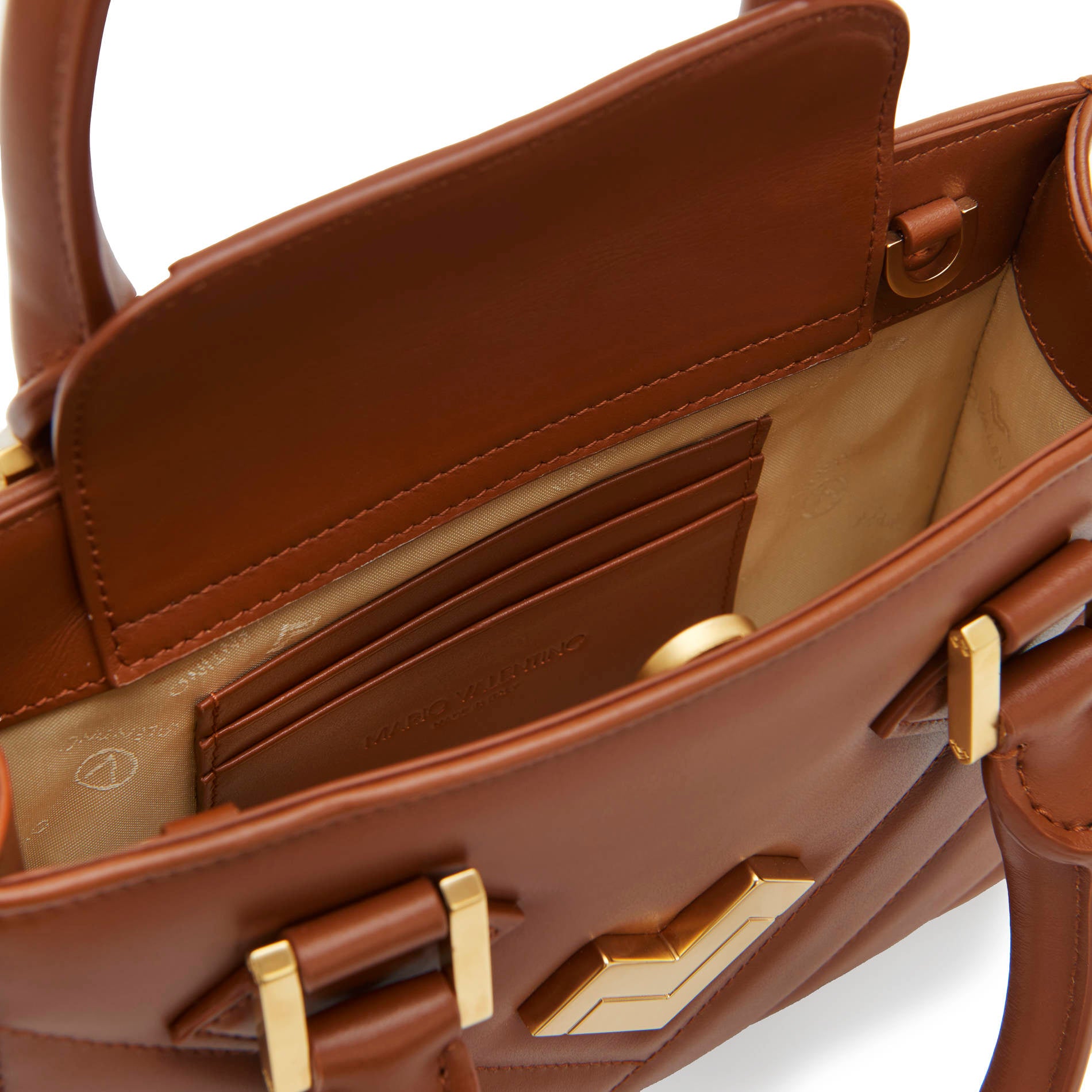 Brown leather crossbody bag interior with card slots and lining, compact everyday handbag. Made in Italy