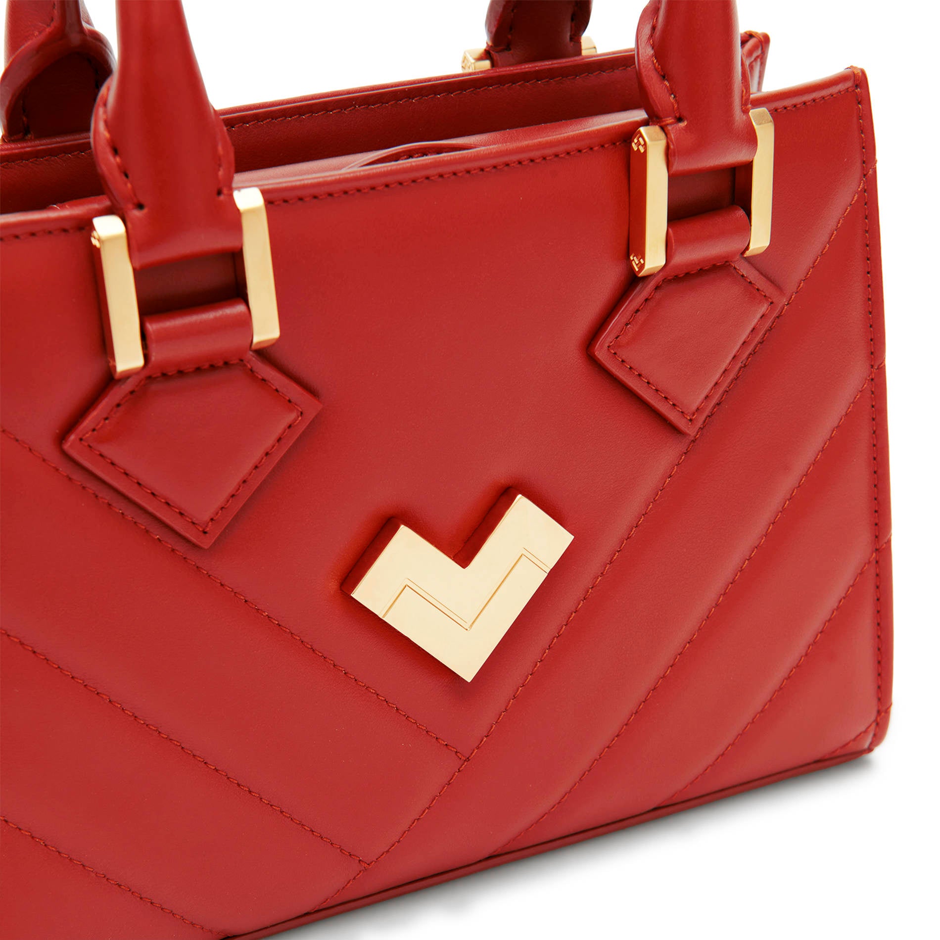 Red leather crossbody bag detail with gold logo and quilted stitching, luxury Mario Valentino handbag Made in Italy