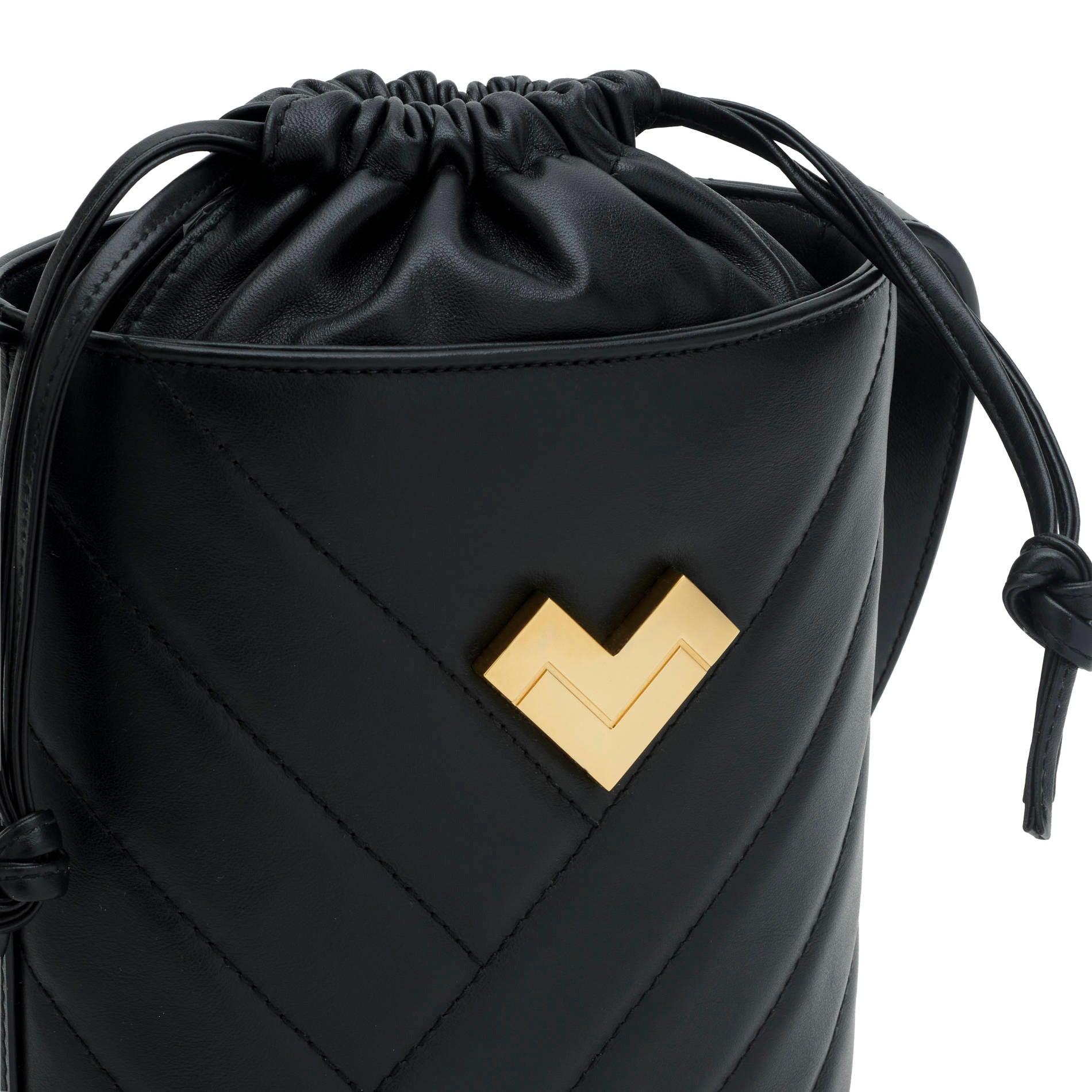 Black quilted leather crossbody bucket bag with chevron stitching, gold-tone logo and leather drawstring detail.