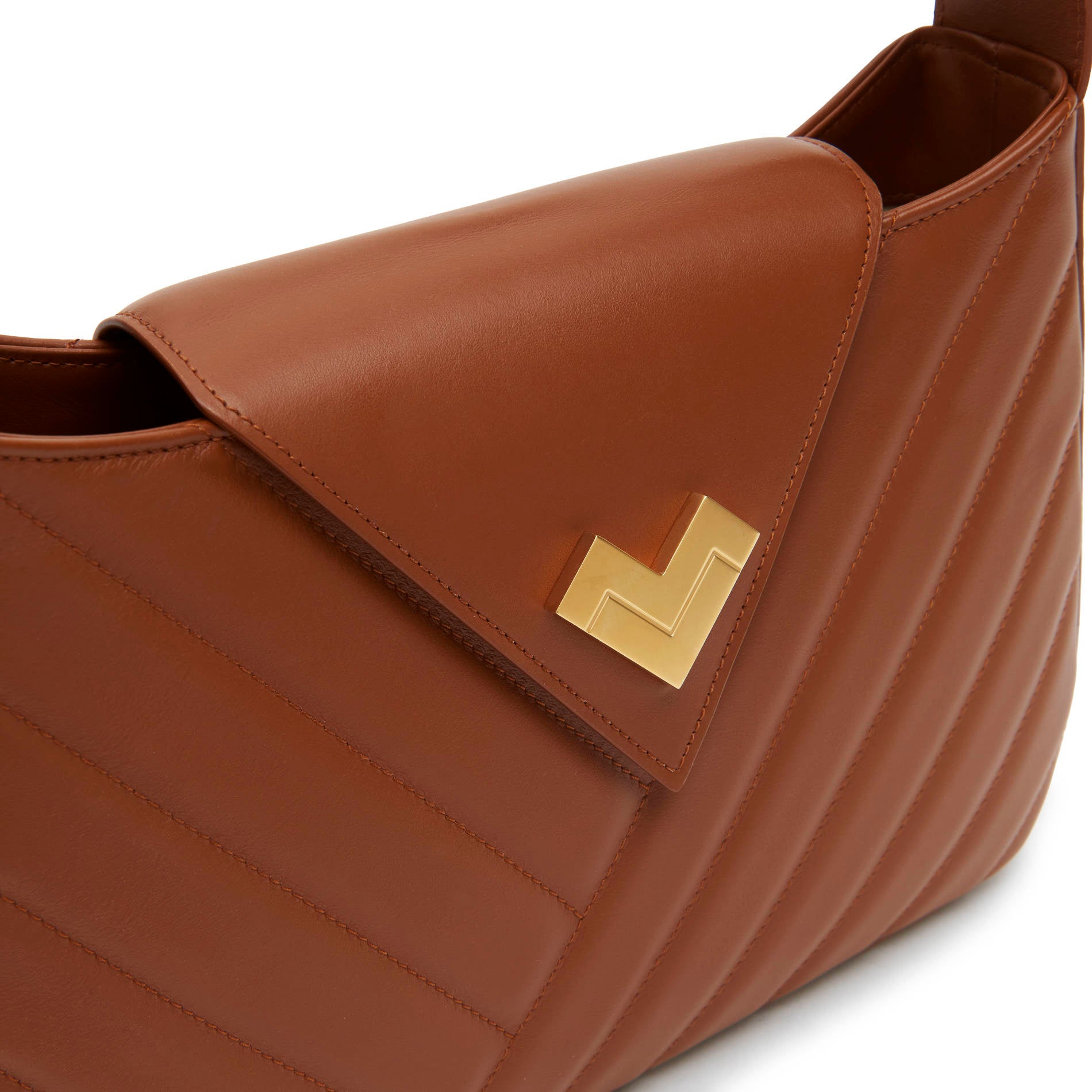 Brown leather shoulder bag with gold logo and quilted chevron detail. Made in Italy