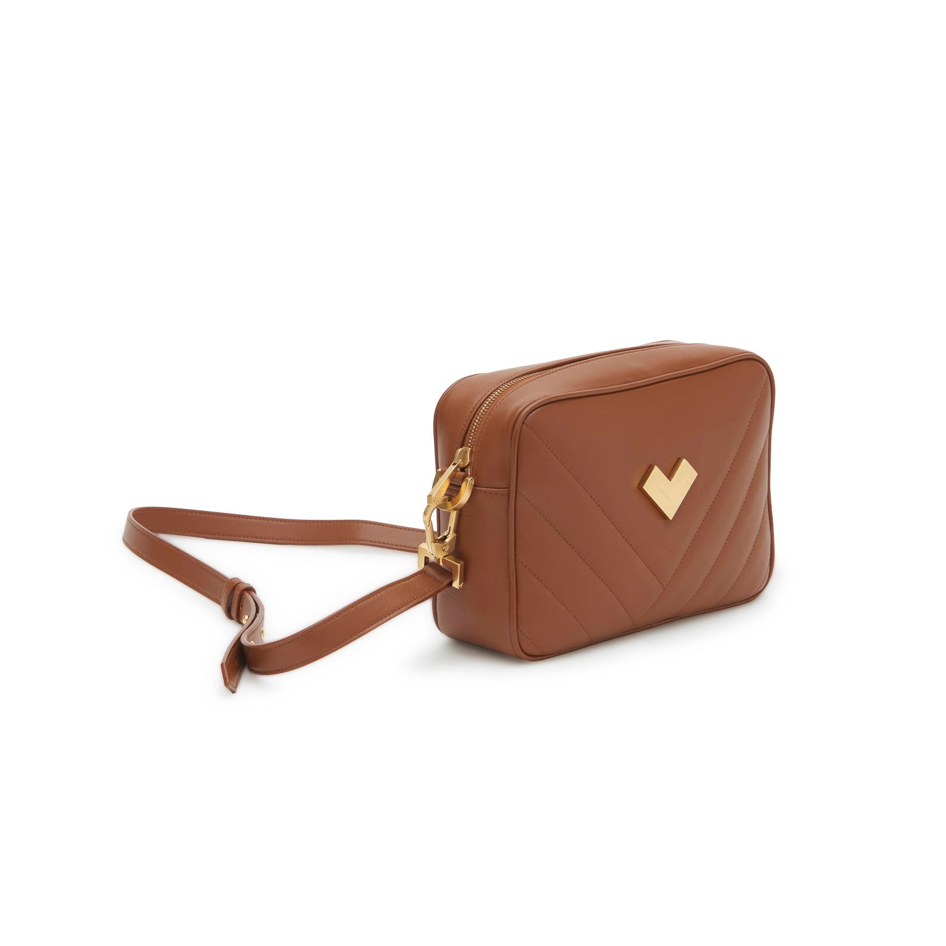 Brown quilted leather crossbody camera bag with gold-tone logo and adjustable strap. Defined by a compact silhouette and clean lines. Made in Italy.