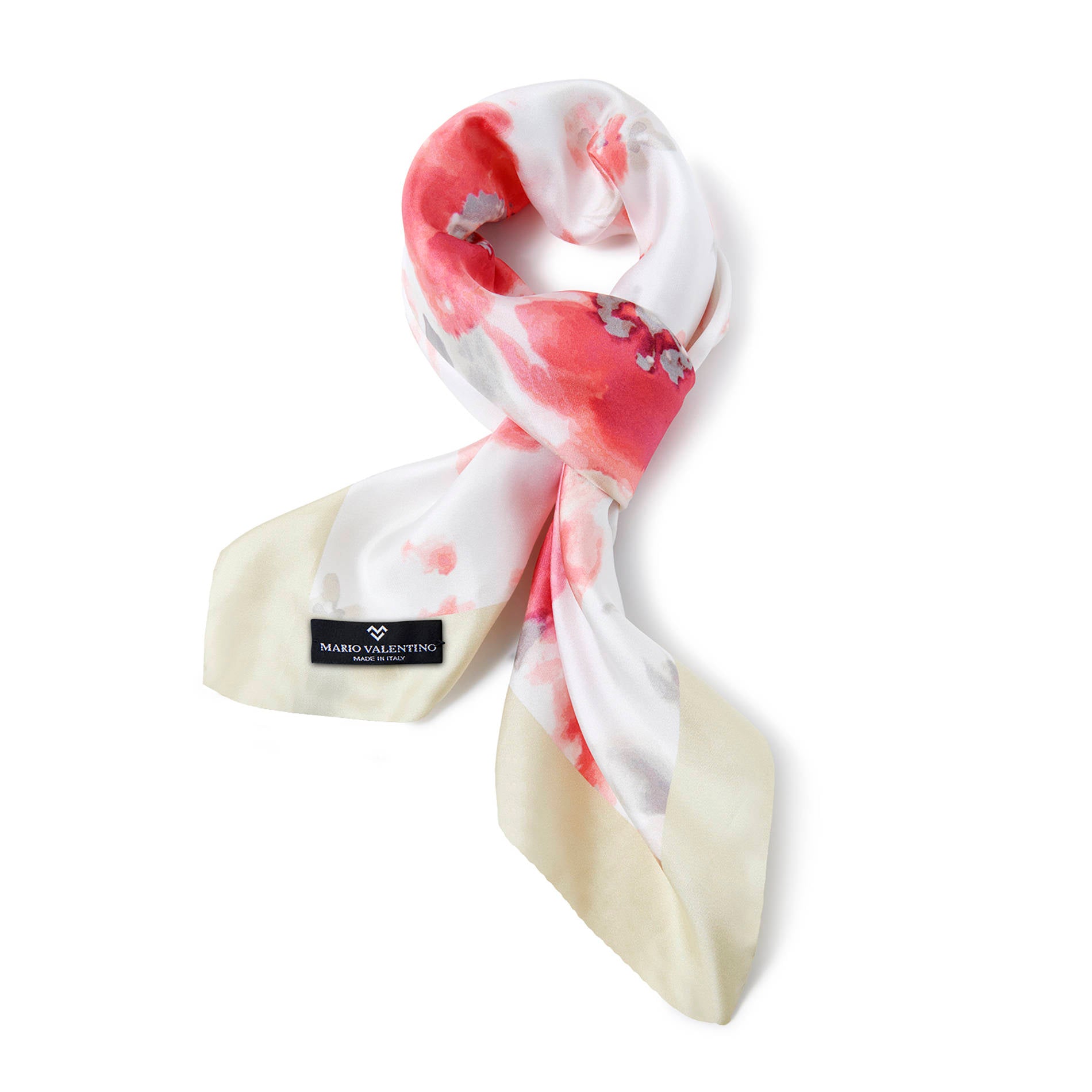 Pure silk foulard defined by a soft floral print. Lightweight, fluid and naturally elegant.