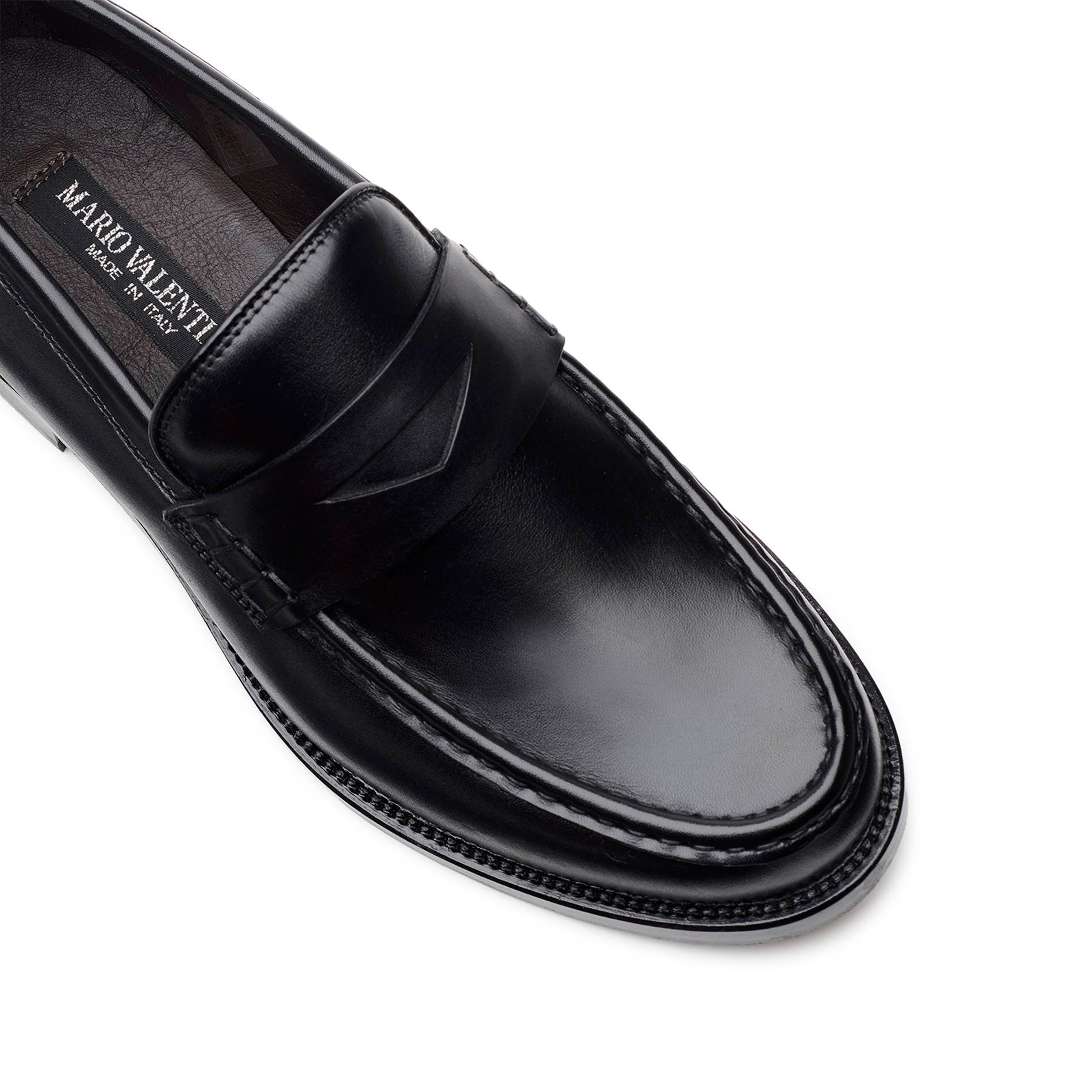 Detail shot of the hand-applied gimping on the penny strap and vamp of the Italian calfskin loafer