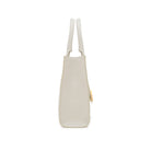 Side view of Mario Valentino white structured tote bag with adjustable shoulder strap.