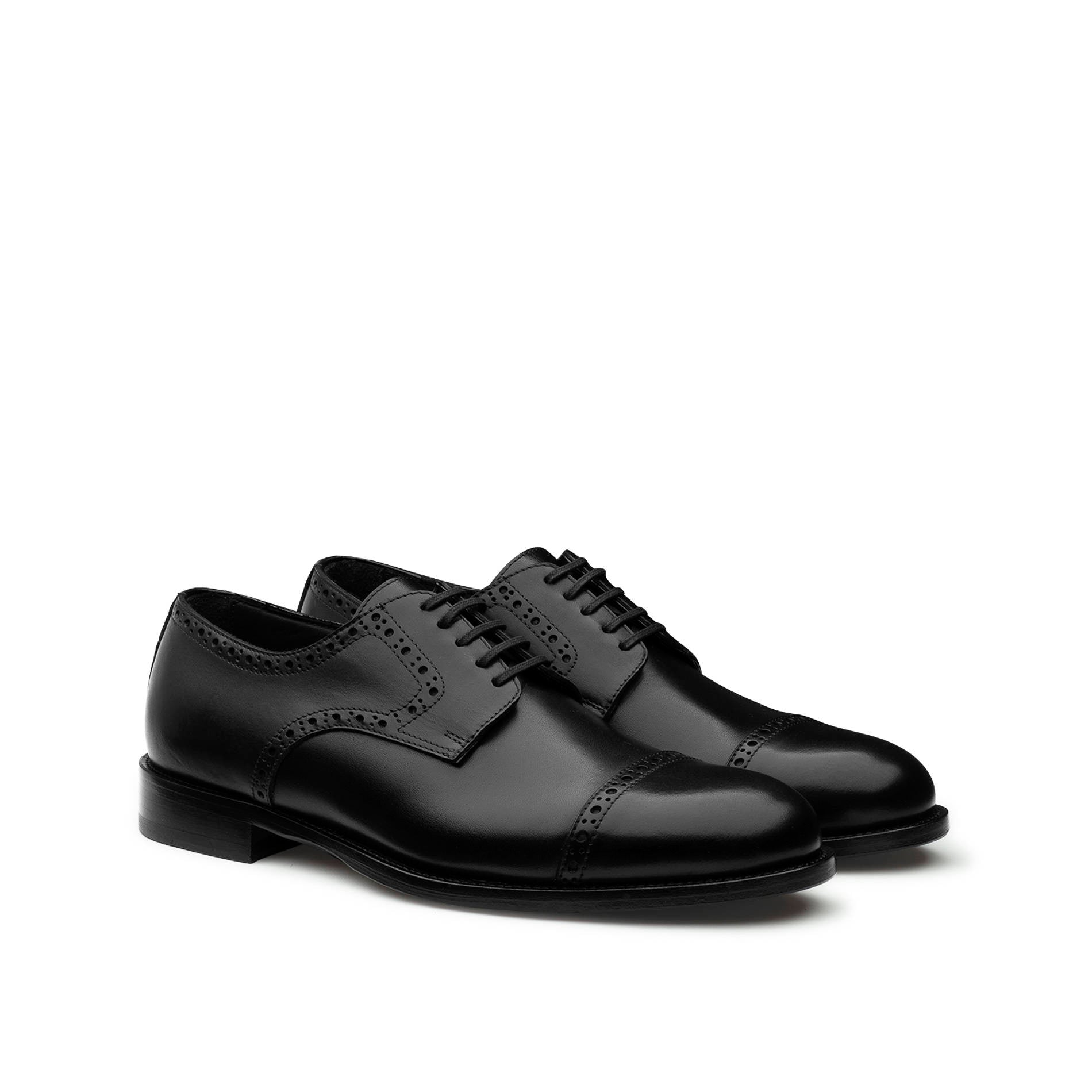 Black calfskin Oxford brogue shoes side view with leather sole