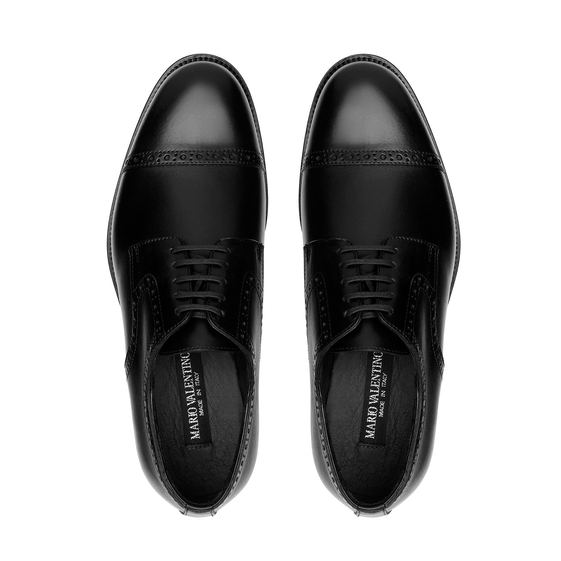 Top view of black Oxford brogue shoes with closed lacing