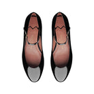 Top view of black patent leather ballet flats with strap and rounded toe