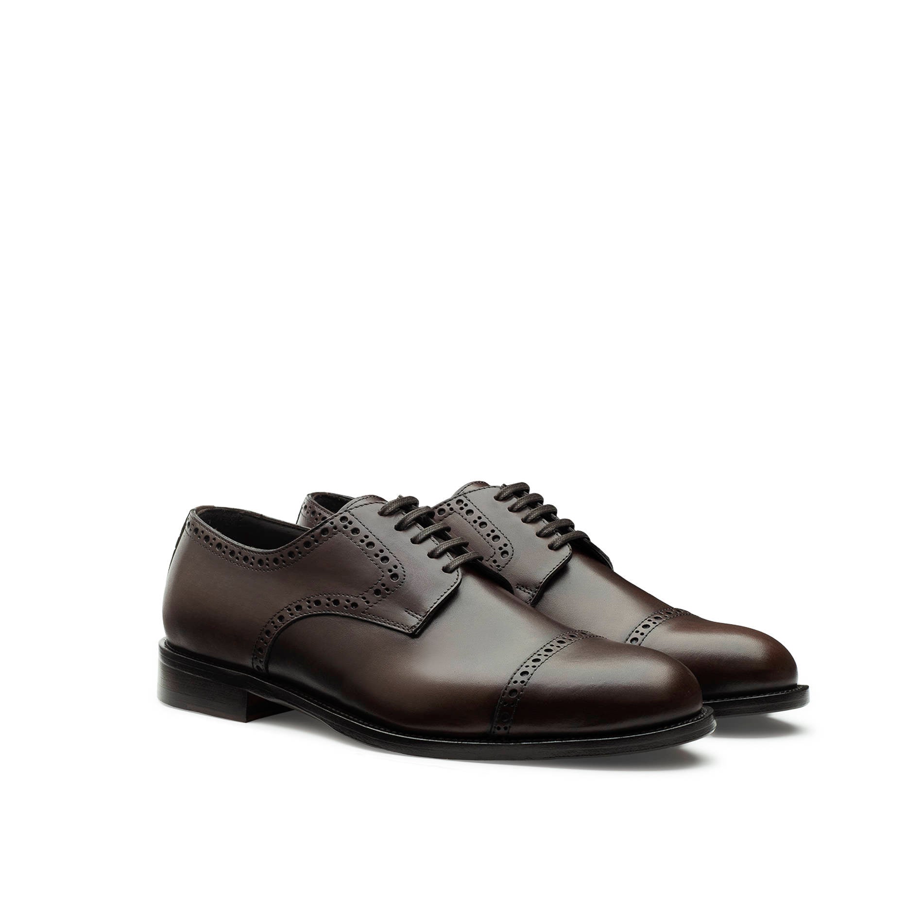 Dark brown calfskin Oxford brogue shoes side view with leather sole