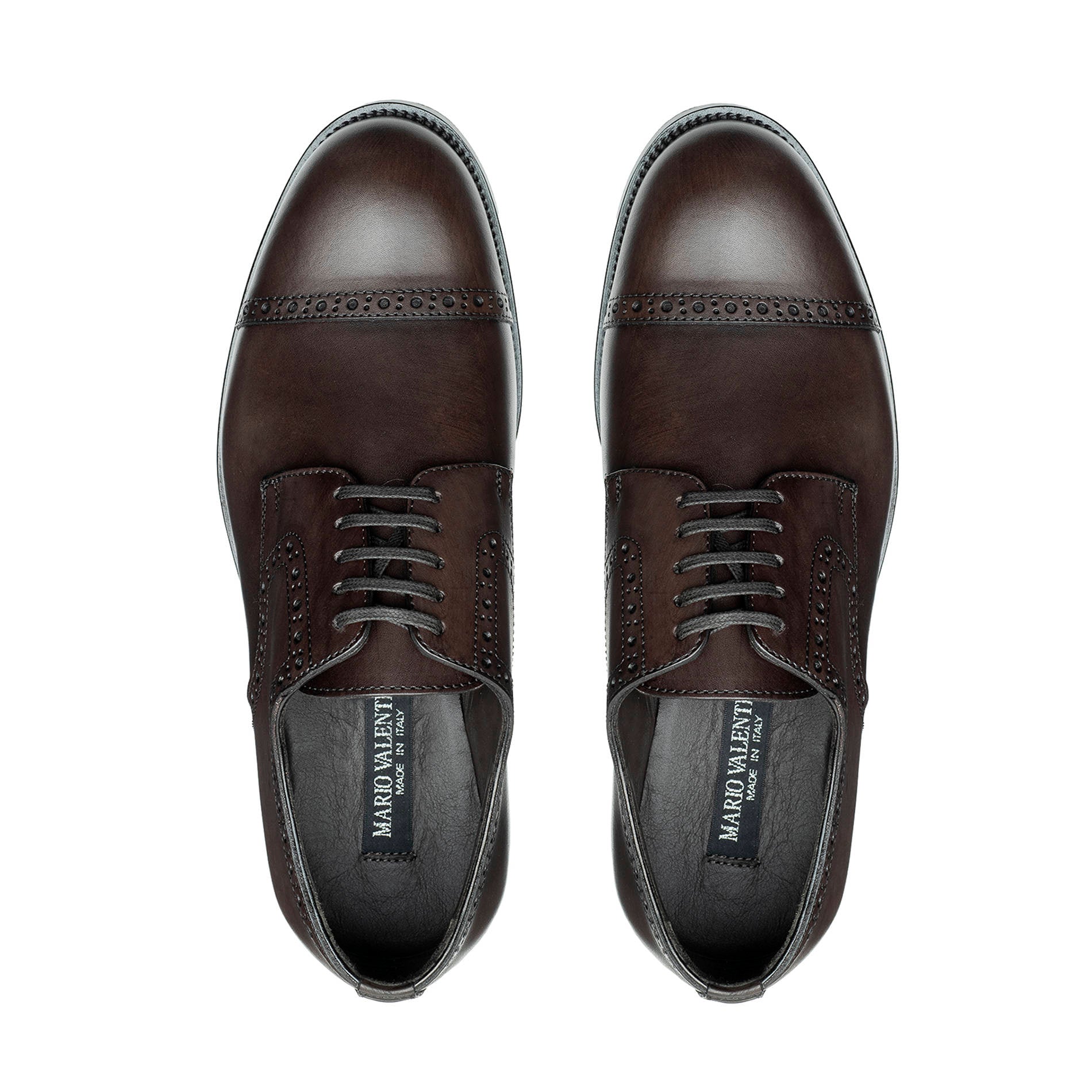 Top view of dark brown Oxford brogue shoes with closed lacing