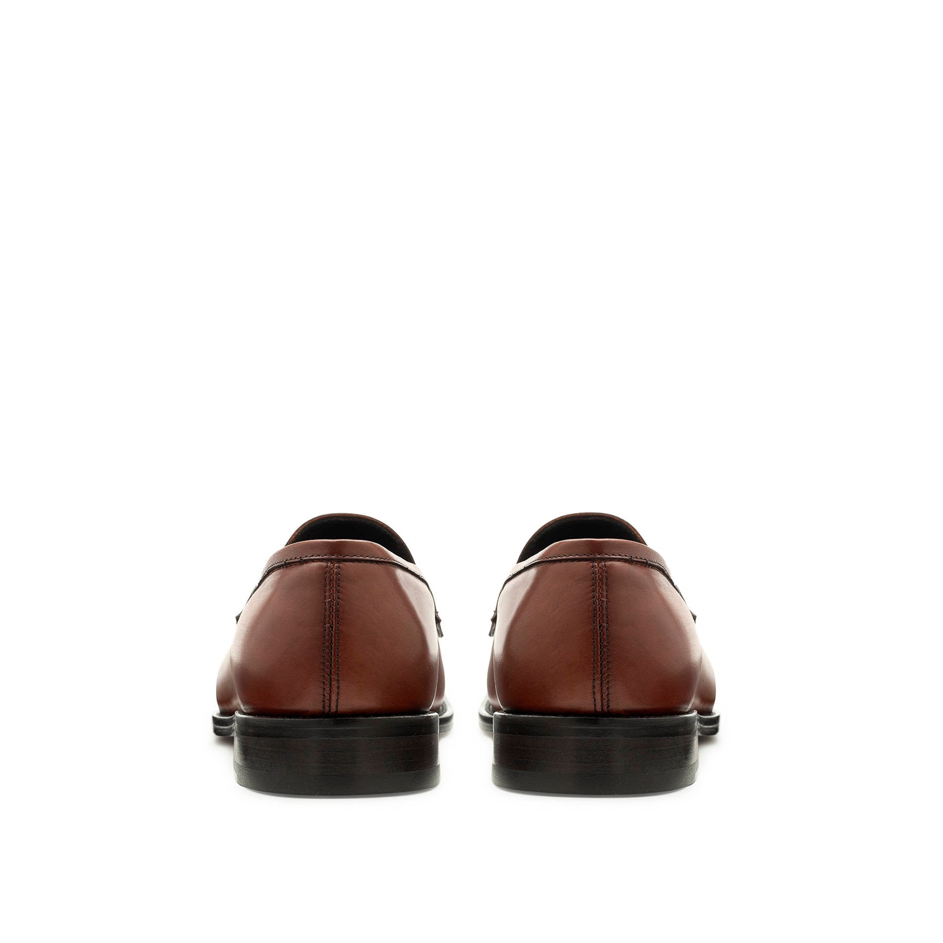Back view of light brown leather penny loafers, Italian craftsmanship