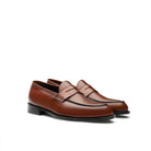 Light brown leather penny loafers side view with leather sole