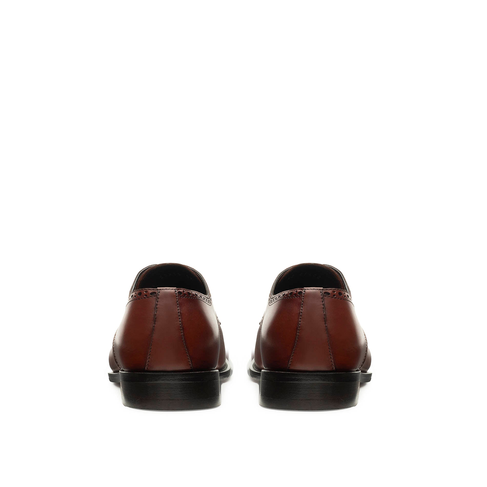 Back view tan leather Oxford shoes with structured heel