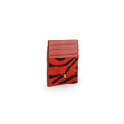 Side view of Mario Valentino zebra-print calfhair card holder with pony-effect texture and MV metal logo.