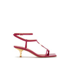 Mario Valentino Valerie magenta patent leather sandals with gold kitten heel, T-strap, and square toe. Made in Italy