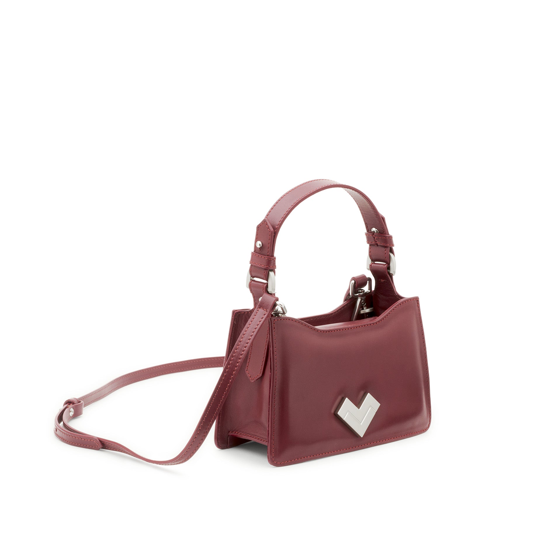 Structured burgundy leather mini bag with silver-tone metal logo, curved silhouette and adjustable leather handle. Made in Italy.