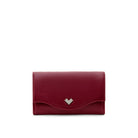 Front view of a burgundy leather clutch bag with curved flap and silver-tone MV logo