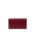Back view of a structured burgundy leather clutch bag with smooth finish and clean silhouette.