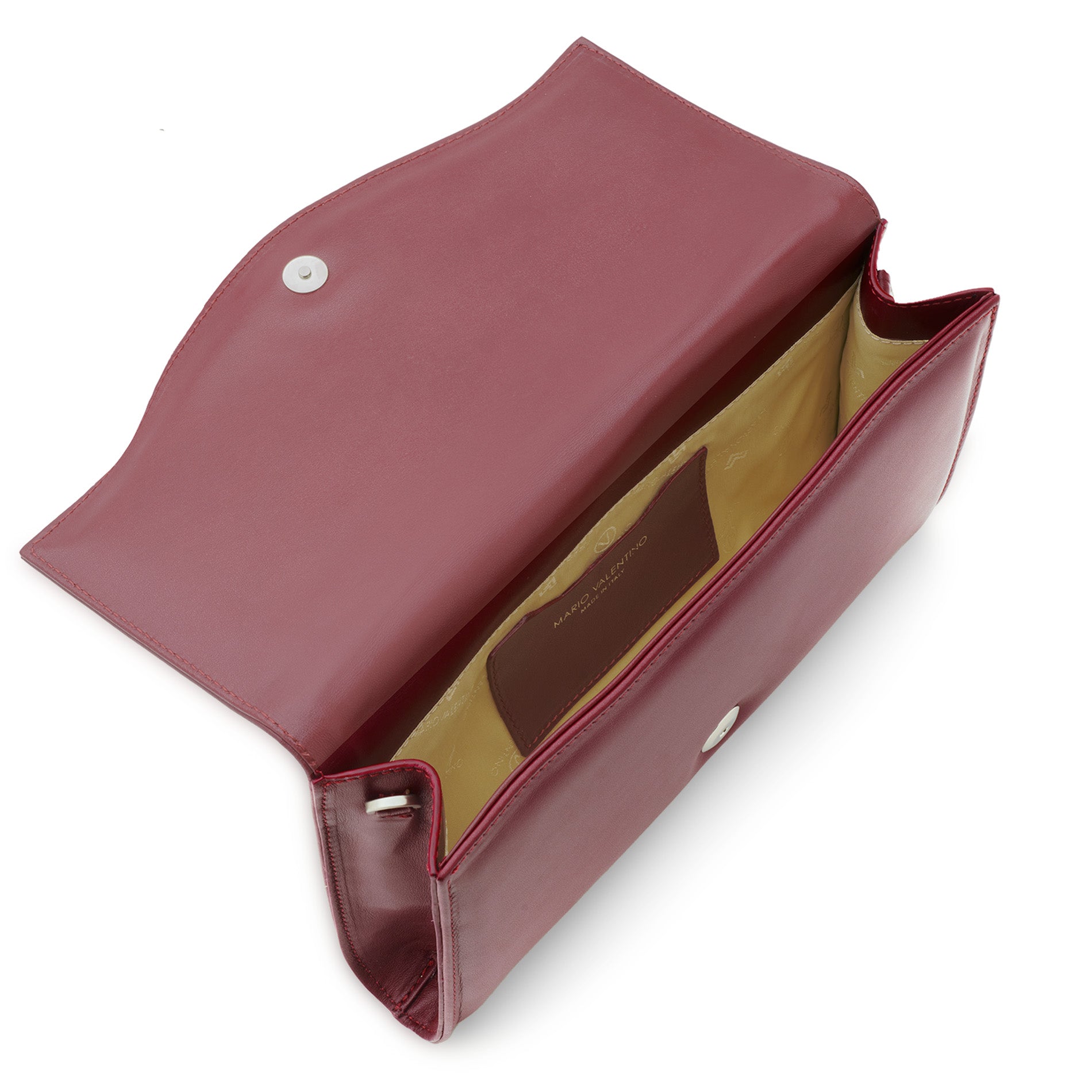 Interior view of a burgundy leather clutch bag with logoed nylon lining and internal leather pocket.