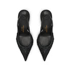 Mario Valentino black leather slingback pumps with pointed toe and intricate woven leather upper, top view.
