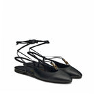 Mario Valentino elegant black slingback ballet flats in kidskin leather, adorned with an ethnic-inspired gold-tone embellishment and delicate lace-up ankle tie.