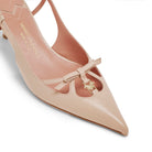 Close-up of leather bow detail and gold MV logo on Mario Valentino Cindy nude leather pointed toe slingback