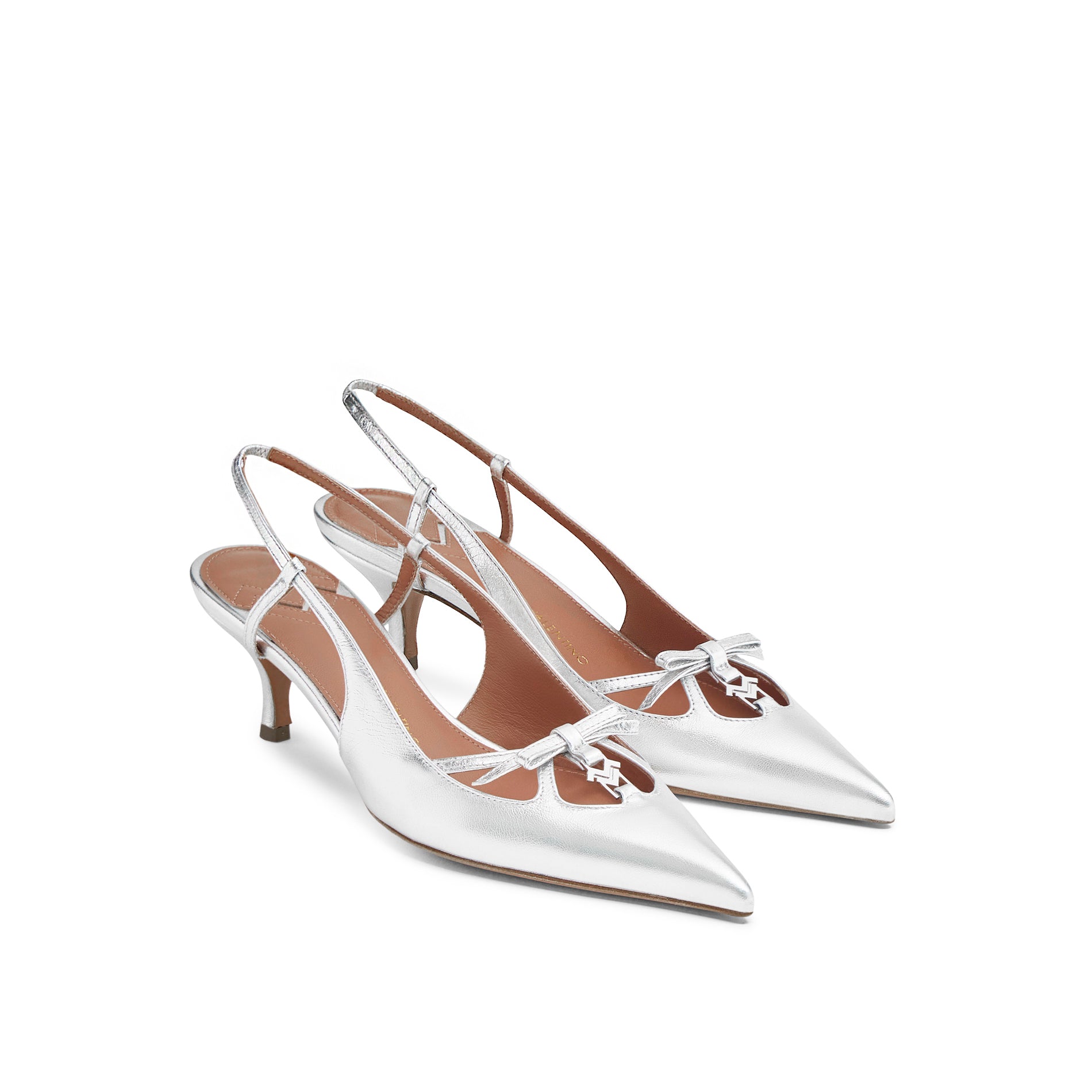 Mario Valentino Cindy silver leather slingback with kitten heel, pointed toe, bow detail and silver MV logo, three-quarter view