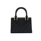 Black quilted leather mini bag back view with gold-tone logo and hardware. Made in Italy.