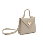 Grey quilted leather crossbody bag in taupe shade with adjustable strap and gold-tone hardware, side view. Made in Italy