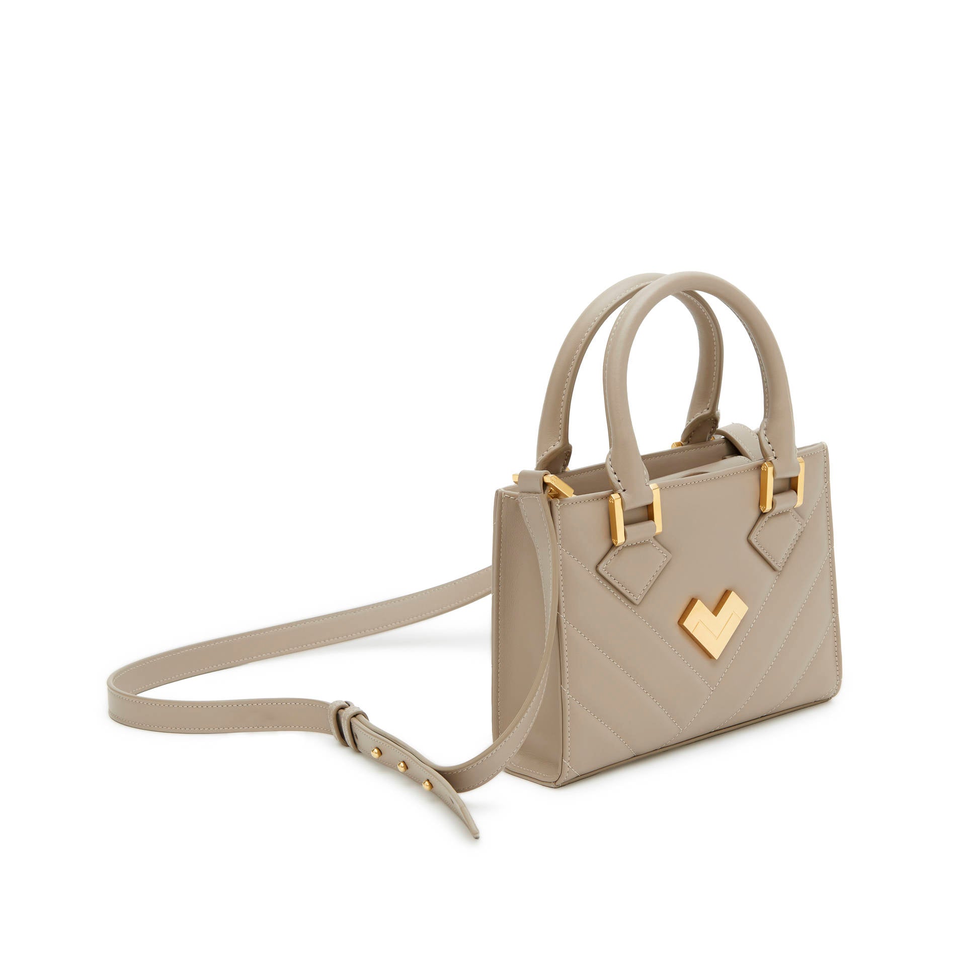 Grey quilted leather mini crossbody bag with gold-tone logo and hardware, adjustable strap.