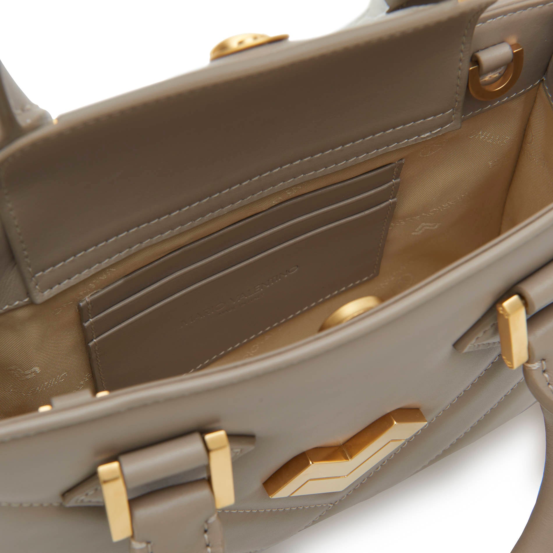 Interior of grey leather mini handbag with cardholder slots and lining, elegant and functional everyday bag Made in Italy