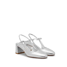 Mario Valentino silver T-bar block heel pumps featuring an adjustable ankle strap and elegant round toe. Made in Italy