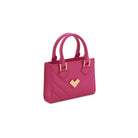 Bright pink quilted leather mini handbag with gold-tone logo and adjustable strap.