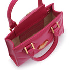 Interior of hot pink leather mini handbag with cardholder slots and lining, elegant and functional everyday bag Made in Italy