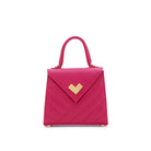 Bright pink quilted leather handbag with gold-tone logo and flap. Compact crossbody design. Made in Italy