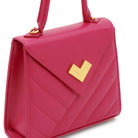 Bright pink quilted leather handbag with gold-tone logo detail.