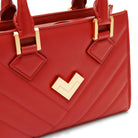 Red leather crossbody bag detail with gold logo and quilted stitching, luxury Mario Valentino handbag Made in Italy