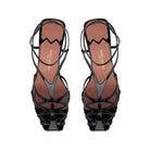 Top view of the Kara sandal revealing its geometric cage silhouette and refined black patent leather straps
