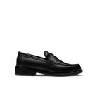 Black calfskin penny loafer with leather sole, front three-quarter view, made in Italy
