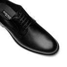 Close-up of the leather sole on black Italian calf leather derby shoes