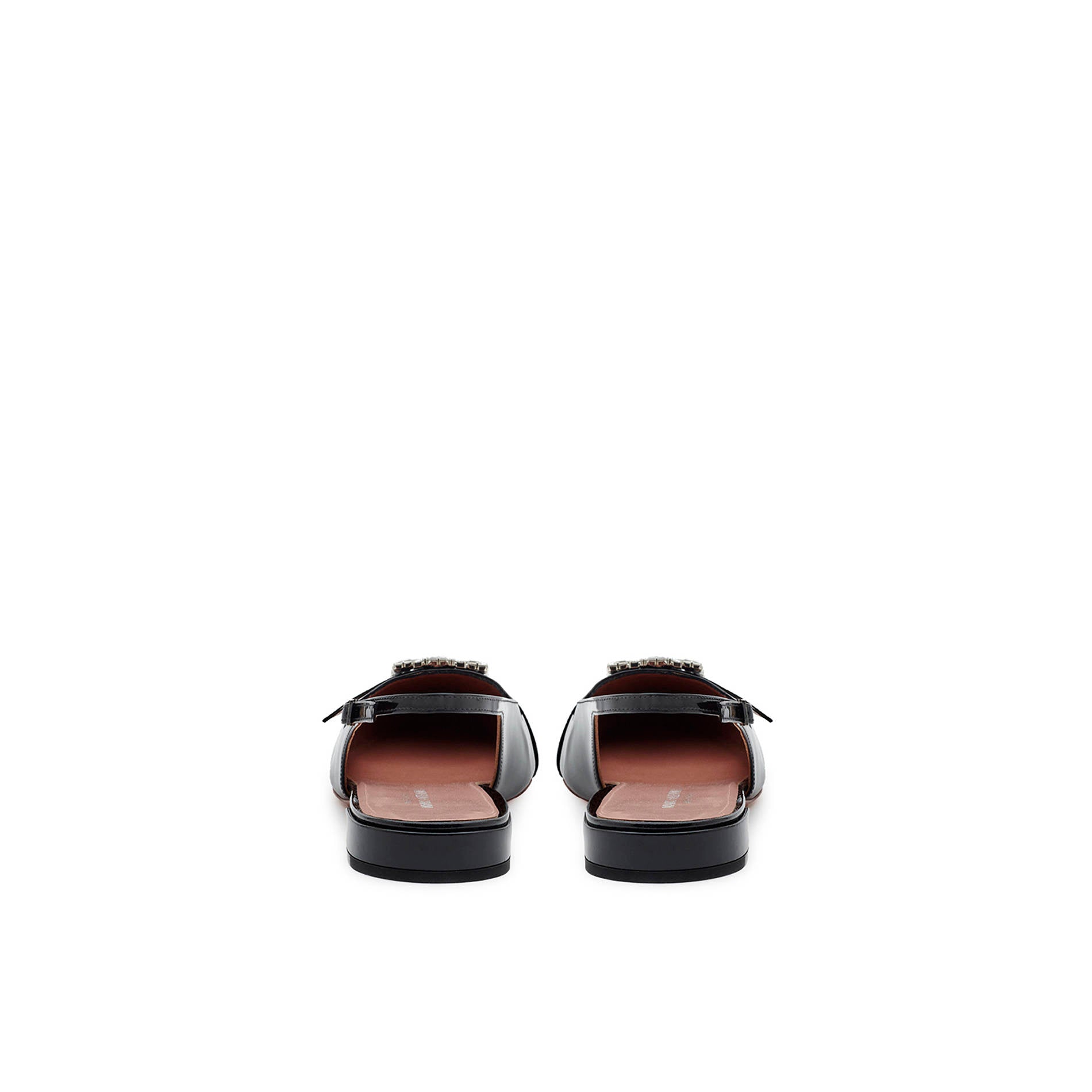 Back view of black patent slingback flats with low heel and elegant silhouette