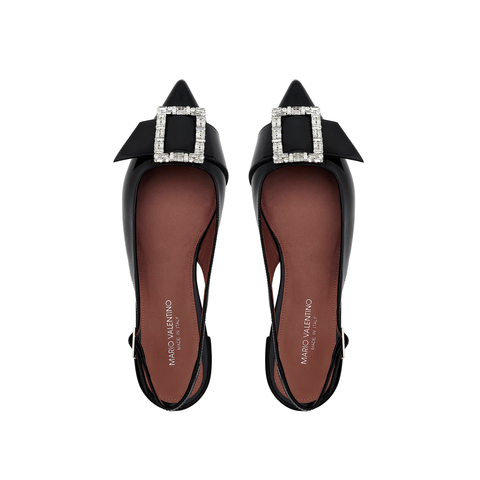 Top view of black patent leather pointed toe slingback flats with