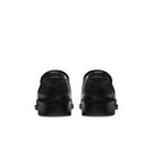 Rear view of black calfskin penny loafer showing the stacked leather heel and clean counter