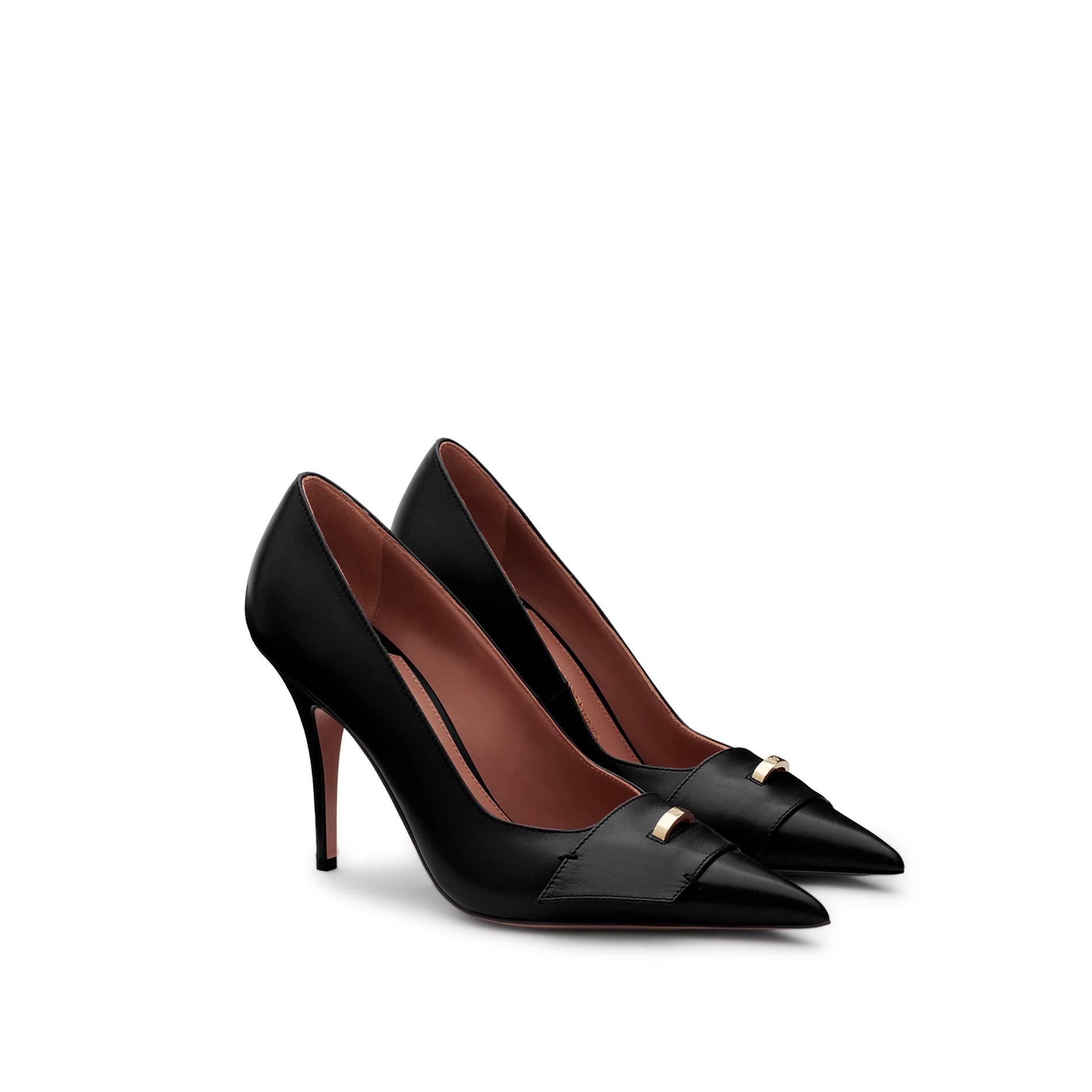 Pair of black leather pumps with pointed toe, gold logo ring accessory and high stiletto heel. Made in Italy
