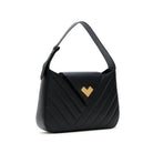 Black quilted leather shoulder bag with gold logo and flap closure. Adjustable handle.