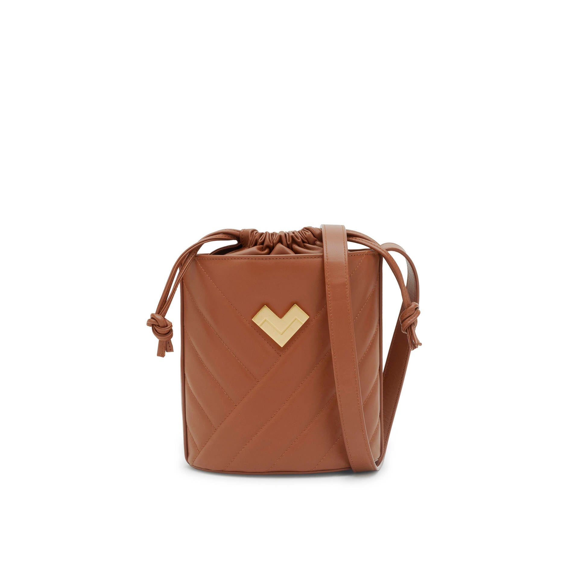 Tan quilted leather crossbody bucket bag with adjustable crossbody strap, gold logo and leather drawstring closure. Made in Italy